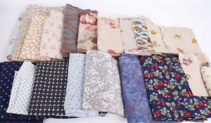 A collection of textiles and dressmaking fabrics, including: Liberty florals, 1960s seersucker