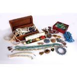 A quantity of vintage costume jewellery, including: necklaces, brooches, bead and pearl necklaces,