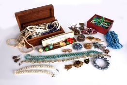 A quantity of vintage costume jewellery, including: necklaces, brooches, bead and pearl necklaces,