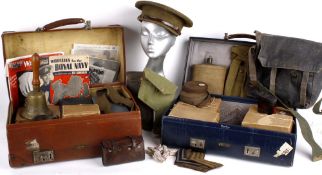 A quantity of Wartime collectables contained within three suitcases, including: a field telephone in