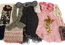A collection of early 20th century passementerie dress trimmings, including: a sequin floral motif