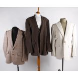 A quantity of vintage menswear, including: shirts, jackets, knitwear and trousers.. Best Bid