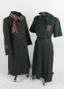 A Women's Voluntary Service/Civil Defence (Kent) green wool dress, (considerable moth damage);