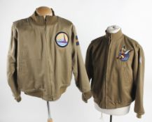 An American khaki bomber jacket, dated 1942; together with a pair of green military issue
