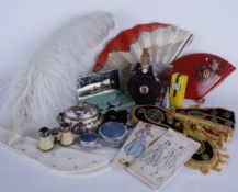 A quantity of textiles and collectables, including: an ostrich feather fan, opera glasses, a