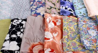 A collection of dressmaking fabric from the 1930s to the 1950s, including: 1940s floral crepe,