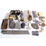 A collection of passementerie, trimmings and ribbon, including: gold metallic braids, two lengths of