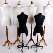 A quantity of shop display mannequins, four examples with cotton covered bodies and wooden bases,