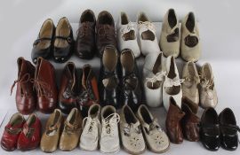 A collection of fifteen pairs of children's shoes dating from the early to the late 20th century,