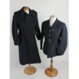 An RAF Officer's day and dress uniforms, circa 1950s; together with two raincoats, an RAF cap, a