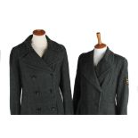 A 1940s green herringbone wool coat with a W.V.S. Civil Defence badge (Kent); together with a