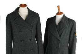 A 1940s green herringbone wool coat with a W.V.S. Civil Defence badge (Kent); together with a