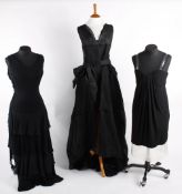 A Chanel Grecian style short black dress; a Moschino black 1920s style evening dress; and an Yves St