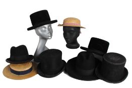 * An Ede & Ravenscroft black top hat; two Morson of Brooklyn, New York hats; a Lock & Co. hat; a