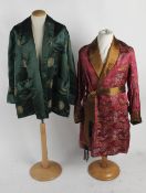 A green satin smoking jacket; together with a vintage dressing gown; a pink and gold satin smoking