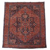 A Serapi carpet , decorated throughout with abstract foliate motifs  A Serapi carpet  , decorated