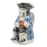 A pearlware Toby jug of Yorkshire type, circa 1800  A pearlware Toby jug of Yorkshire type,