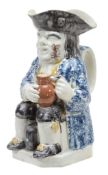 A pearlware Toby jug of Yorkshire type, circa 1800  A pearlware Toby jug of Yorkshire type,