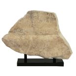 An Egyptian limestone stele fragment, Middle Kingdom, 11th-12th Dynasty  An Egyptian limestone stele