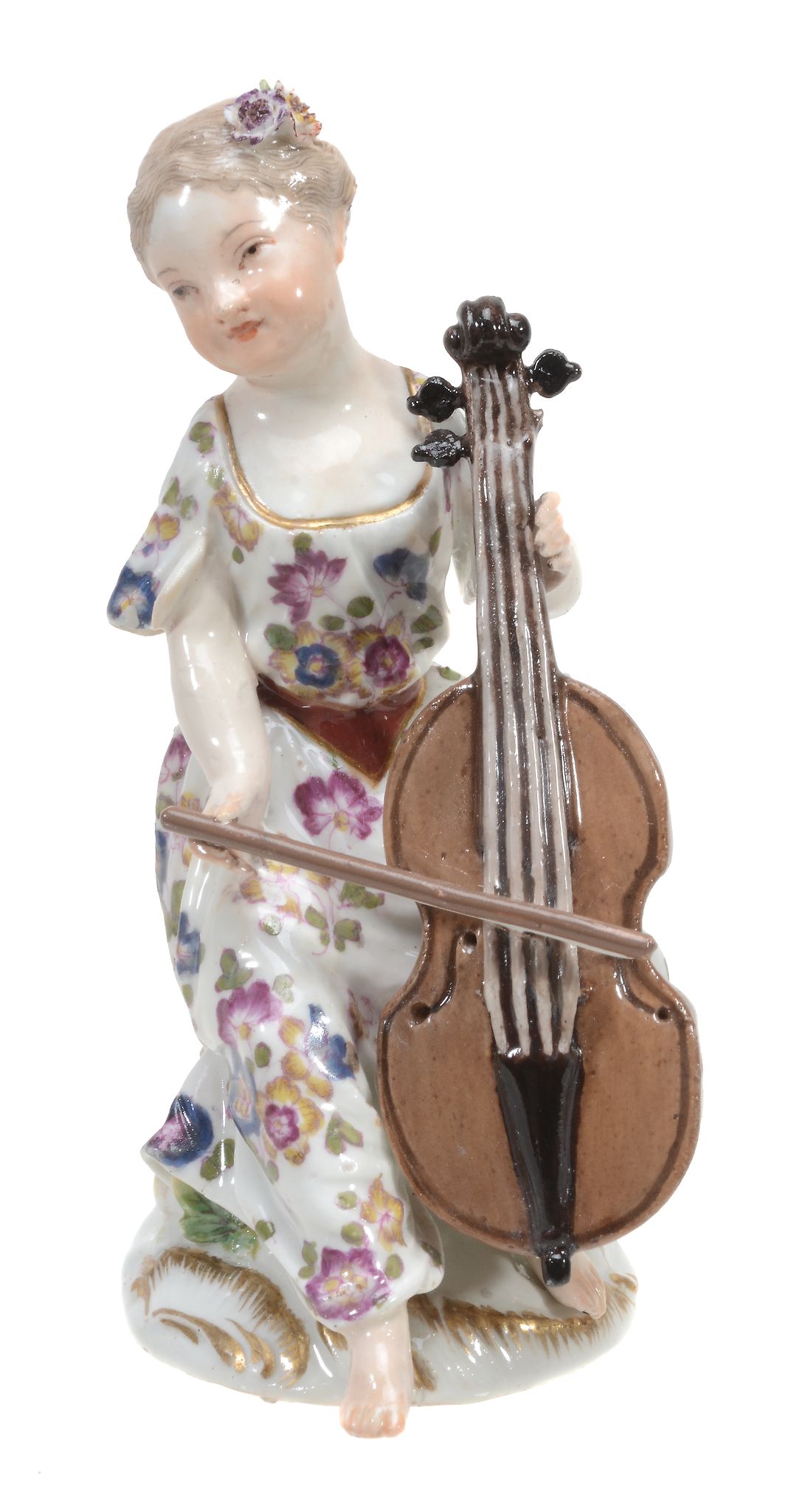 A Meissen model of a seated girl playing the cello, mid 18th century, 13  A Meissen model of a