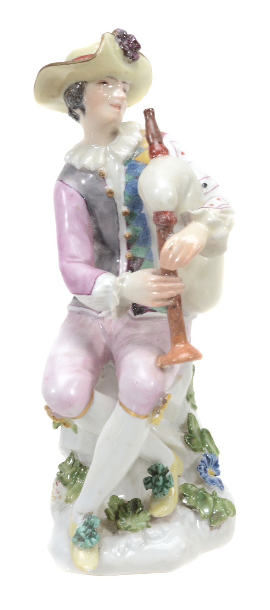 A Meissen model of Harlequin playing the bagpipes, mid 18th century  A Meissen model of Harlequin