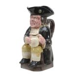 An English pearlware Toby jug of so-called 'collier' type, circa 1800  An English pearlware Toby jug
