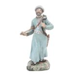 A Moscow porcelain figure of a Tartar archer, mid 19th century  A Moscow porcelain (Popov Factory)