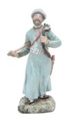 A Moscow porcelain figure of a Tartar archer, mid 19th century  A Moscow porcelain (Popov Factory)