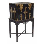 An Anglo Dutch brass mounted ebony cabinet on stand  An Anglo Dutch brass mounted ebony cabinet on