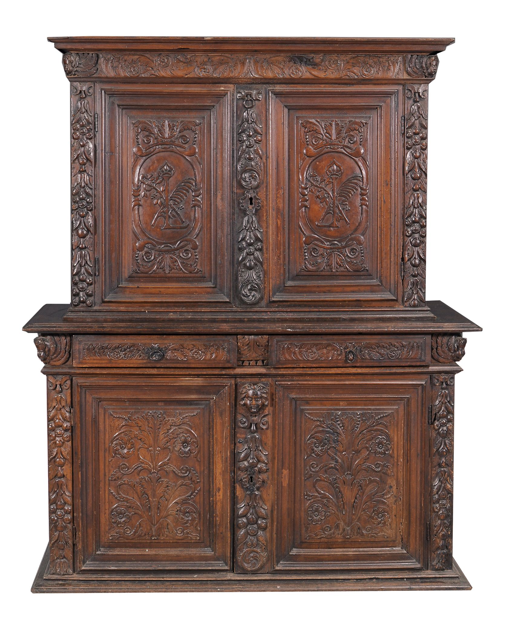 A Continental walnut cupboard, probably Italian, late 17th/ early 18th century  A Continental walnut