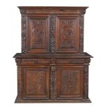 A Continental walnut cupboard, probably Italian, late 17th/ early 18th century  A Continental walnut