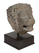 A Neo-Hittite basalt head of a lion Circa 8th-7th Century B.C  A Neo-Hittite basalt head of a