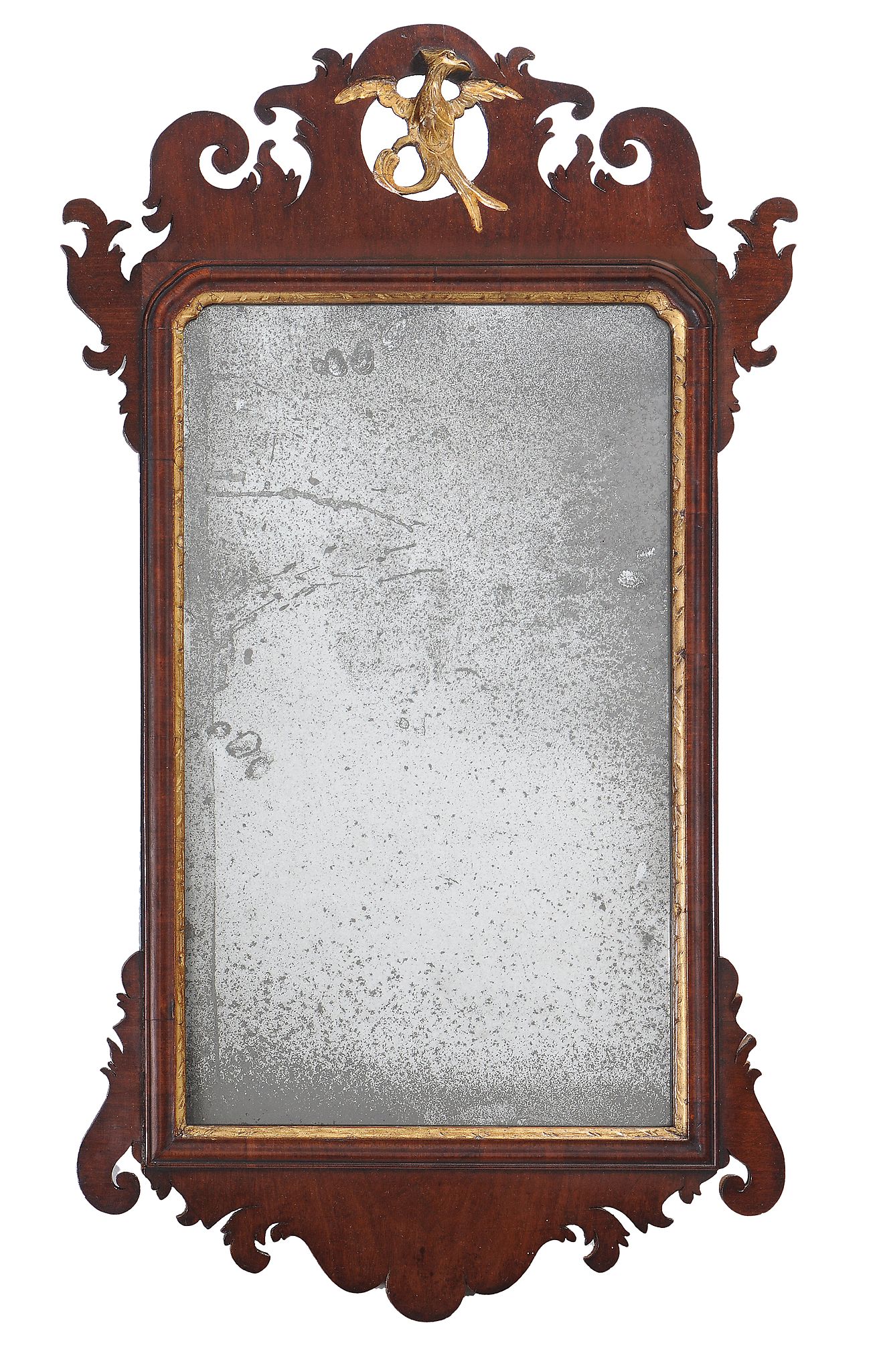 A George II mahogany and parcel gilt wall mirror, circa 1750  A George II mahogany and parcel gilt