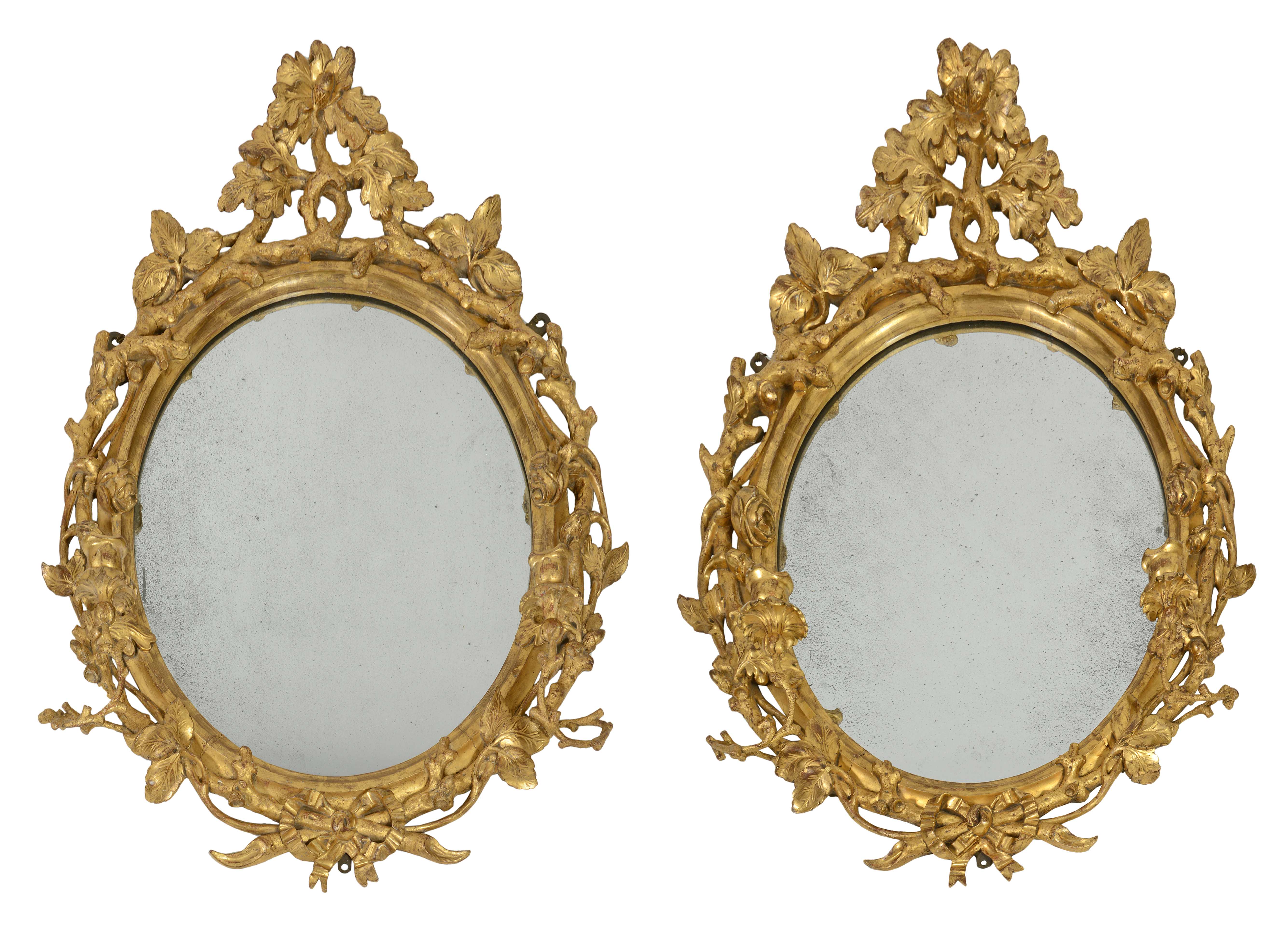 A pair of George III carved giltwood oval girandole wall mirrors, circa 1760 A pair of George III - Image 2 of 2