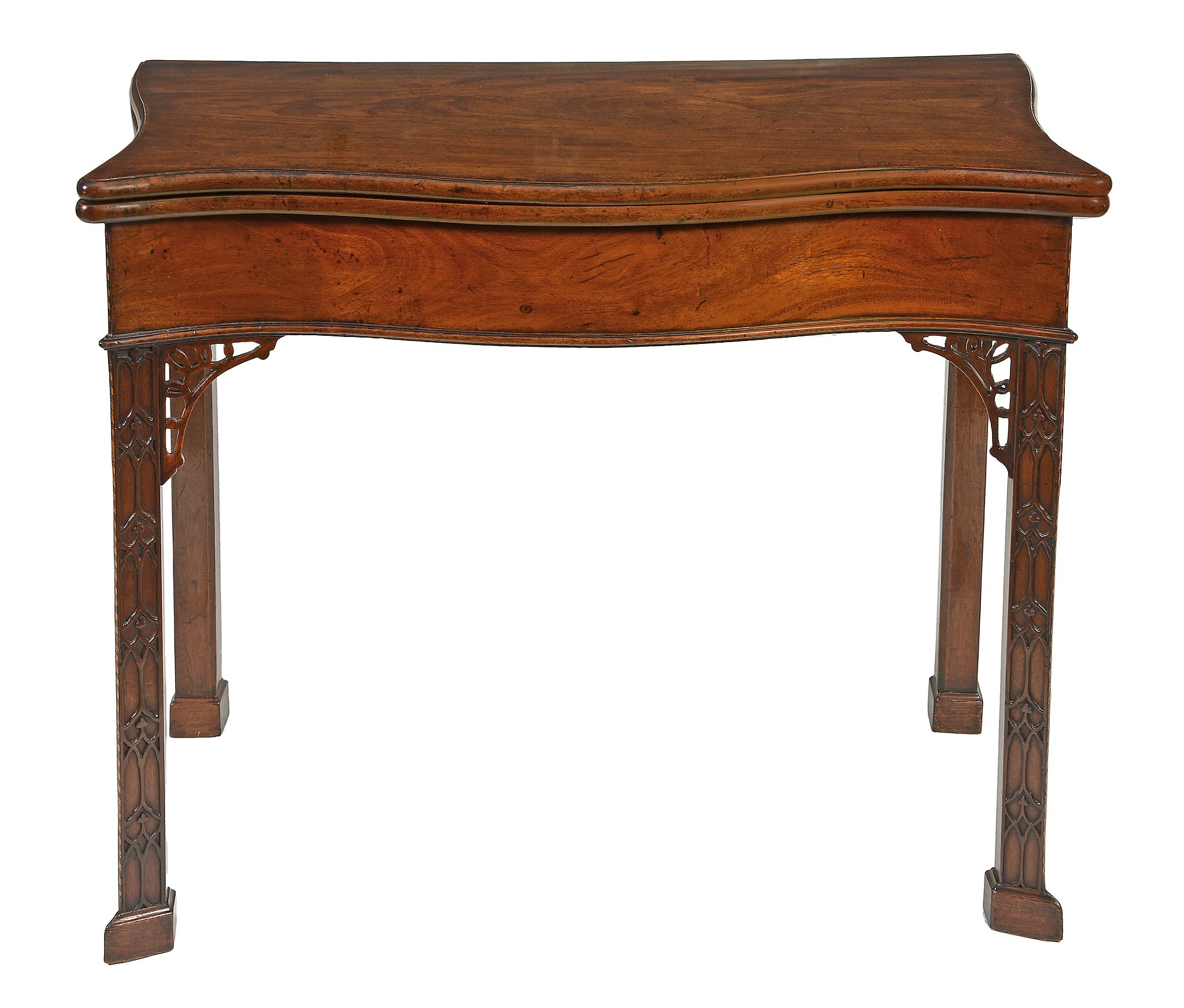 A George III mahogany serpentine folding card table, circa 1760  A George III mahogany serpentine