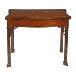 A George III mahogany serpentine folding card table, circa 1760  A George III mahogany serpentine