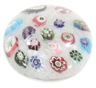 A Clichy scattered millefiori glass paperweight, mid 19th century  A Clichy scattered millefiori