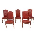 A set of ten oak and leather upholsered chairs in Louis XV style  A set of ten oak and leather