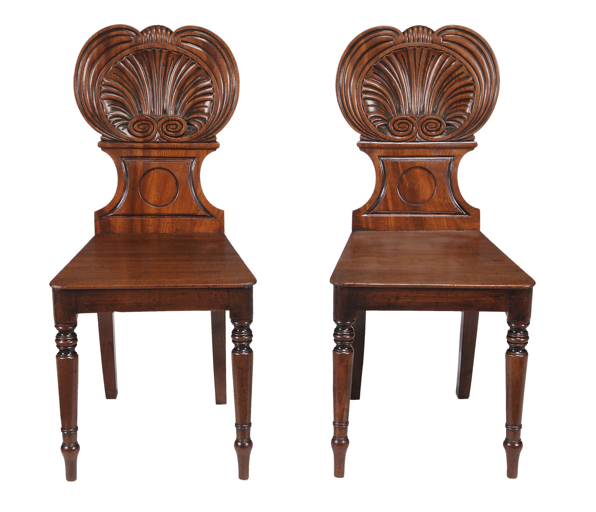 A pair of Regency mahogany hall chairs , circa 1815  A pair of Regency mahogany hall chairs  , circa