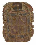 A Spanish carved, painted and parcel gilt walnut armorial panel  A Spanish carved, painted and