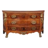 A George III harewood, mahogany, and marquetry serpentine commode , circa 1770 A George III