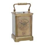 A rare French brass half-hour sonnerie striking carriage clock with...  A rare French brass half-