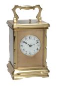 A French lacquered brass carriage clock with push-button repeat Unsigned  A French lacquered brass