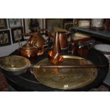 A collection of copper items to include a copper kettle, warming pan, circular tray (qty)
