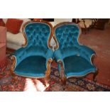 A Victorian carved mahogany 'grandmother' and 'grandfather' armchairs