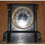 A 19th Century black slate mantel clock, 20cm high