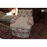 An early 20th century upholstered armchair