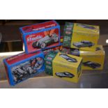 Three boxed Schuco Studio Mercedes Gran Prix 1936, and three boxed 01:43 Classic Sports Cars , Aston