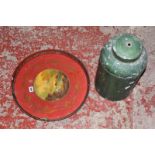 A painted black rectangular metal tray, a red painted circular metal tray and a green painted tea