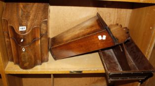 A George III mahogany serpentine knife box, 36.5cm high, a George III mahogany candlebox and a